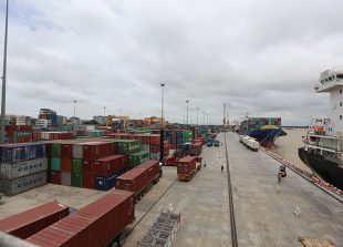 containers-ship-at-Asia-World-port