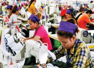 workers-stitch-garments-at-a-factory-in-phnom-penhs-por-sen-chey-district-vireak-mai