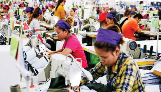 workers-stitch-garments-at-a-factory-in-phnom-penhs-por-sen-chey-district-vireak-mai