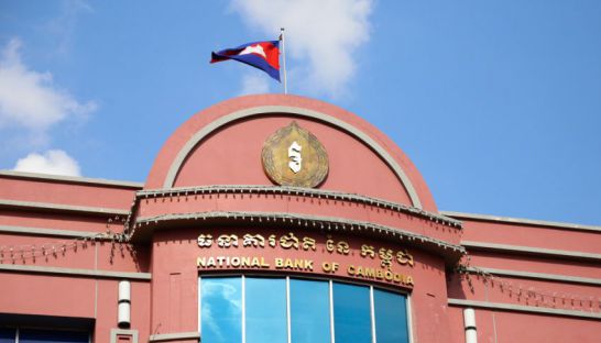 business_the_cambodian_national_flag_flies_on_top_of_the_national_bank_of_cambodias_headquarters_earlier_this_year_in_phnom_penh_hong_menea