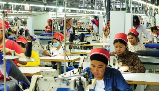 business_-_workers_stitch_clothes_at_a_garment_factory_stationed_in_sihanoukville_special_economic_zone_sahiba_chawdhary