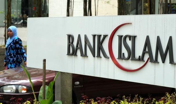 A logo of Bank Islam Malaysia is seen at the bank's headquarters in Kuala Lumpur on November 12, 2008. Malaysian Prime Minister Abdullah Ahmad Badawi said that the global economic crisis presents an opportunity for Islamic banking to show it is a viable alternative to conventional finance. Badawi said the meltdown showed the need for laws enshrined in Islamic banking, which prohibits speculation and high levels of debt, and which has so far been relatively unscathed by the credit crunch. AFP PHOTO / Saeed KHAN (Photo credit should read SAEED KHAN/AFP/Getty Images)