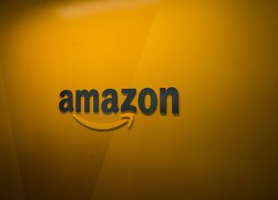 SEATTLE, WA - JUNE 16: An Amazon logo is seen inside the Amazon corporate headquarters on June 16, 2017 in Seattle, Washington. Amazon announced that it will buy Whole Foods Market, Inc. for over $13 billion.   David Ryder/Getty Images/AFP
