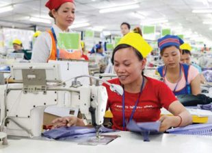 an-employee-works-at-a-garment-factory-in-phnom-penhs-por-sen-chey-district-in-2014-vireak-mai_0_0