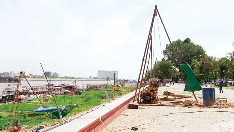 boats-can-be-seen-on-a-riverside-plot-in-phnom-penh-in-january-that-was-recently-transferred-from-state-public-distinction-to-state-private-heng-chivoan