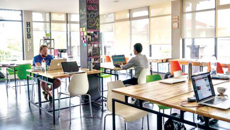 people-work-at-impact-hub-a-co-working-space-in-phnom-penh-that-is-utilised-by-local-startups-in-2015-charlotte-pert